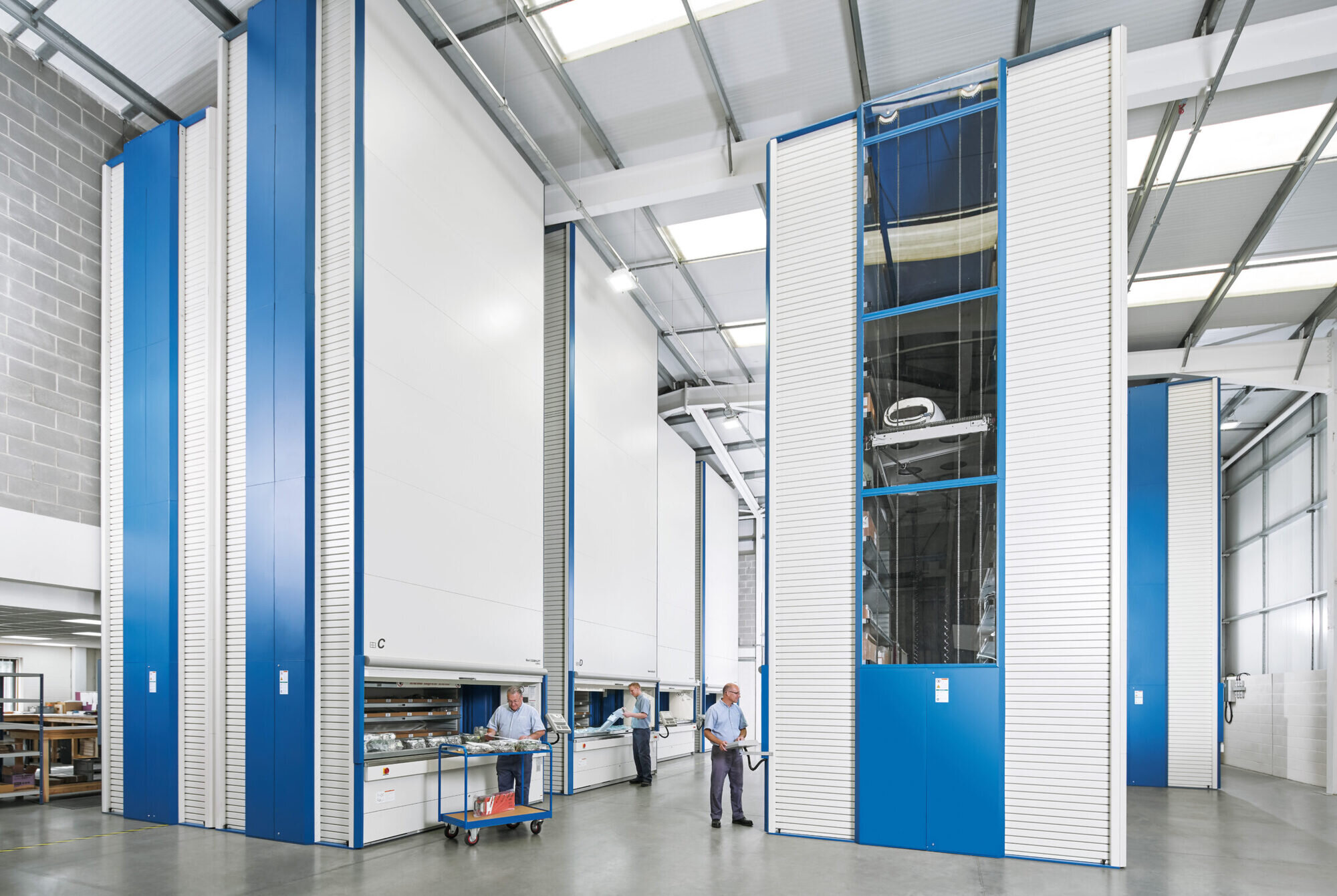 Industore's VLM (vertical lift modules) operating in a manufacturing and distribution setting