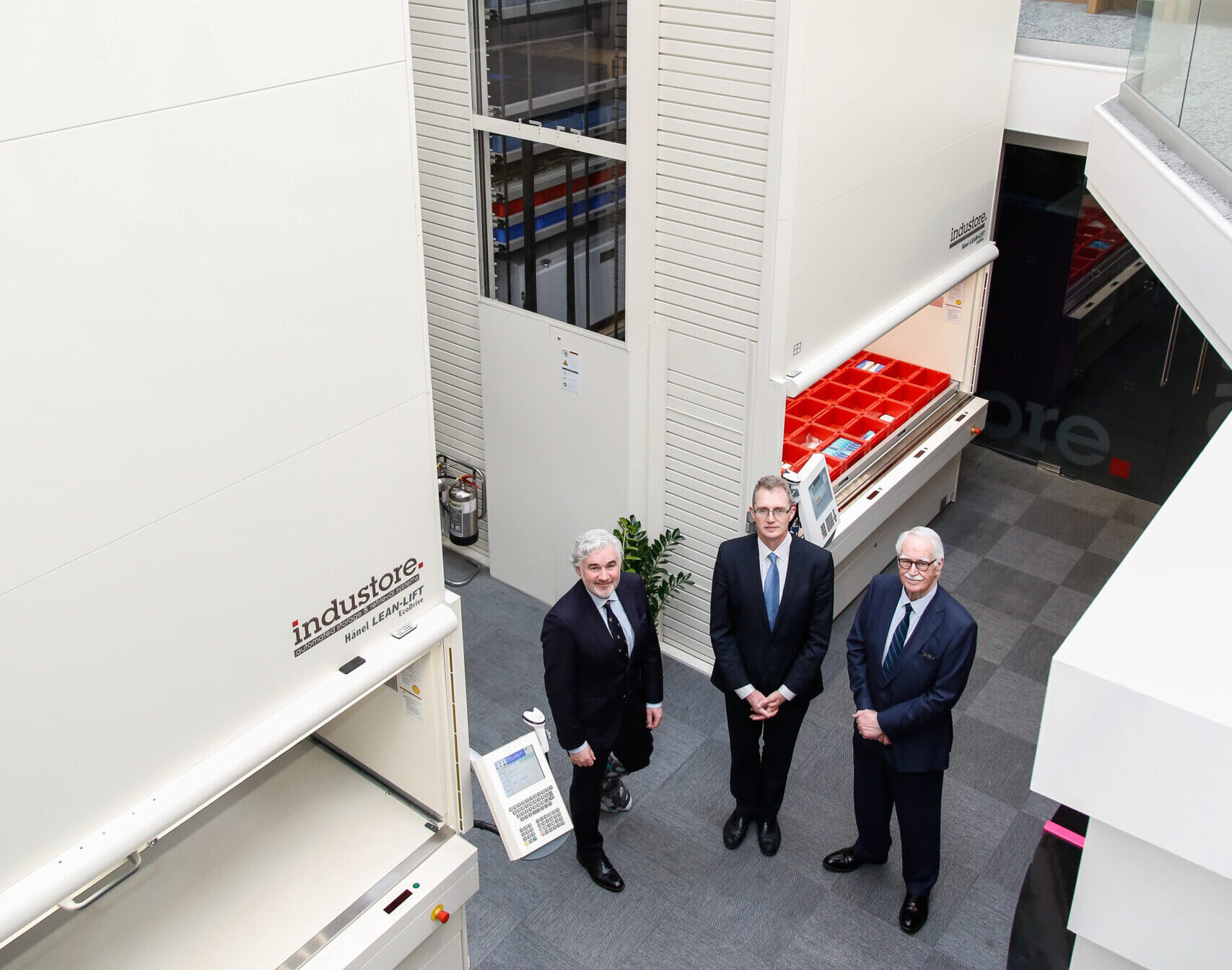 Secretary of State for Wales at Industore's ASRS (automated storage and retrieval systems) Demo Centre in Cardiff with Ross and Ricahrd Powell.