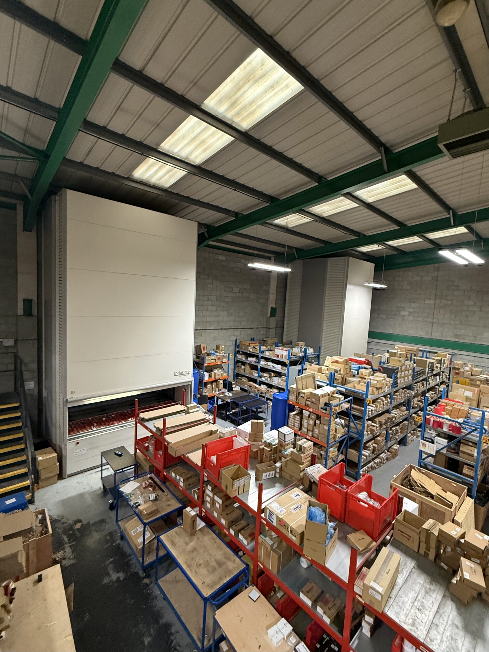 Heavy-duty tooling stored safely at waist height in Lean-Lift VLM and traditional warehouse racking